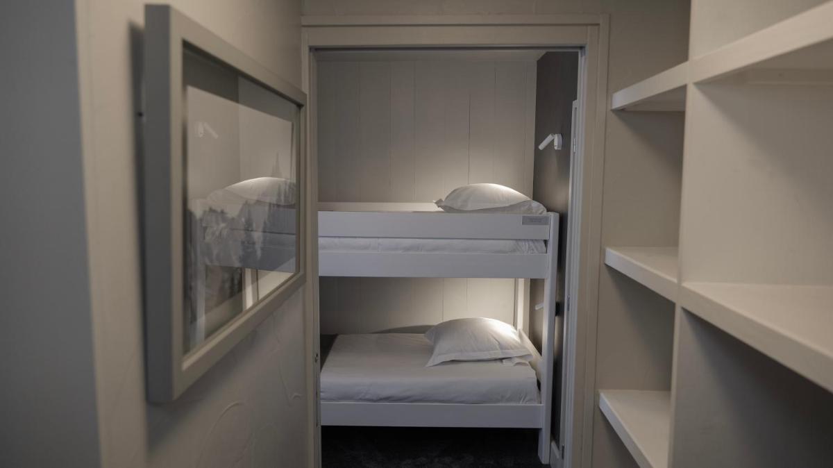 Un ou plusieurs lits dans un hébergement de l'établissement Le Faucigny - Hotel de Charme & SPA