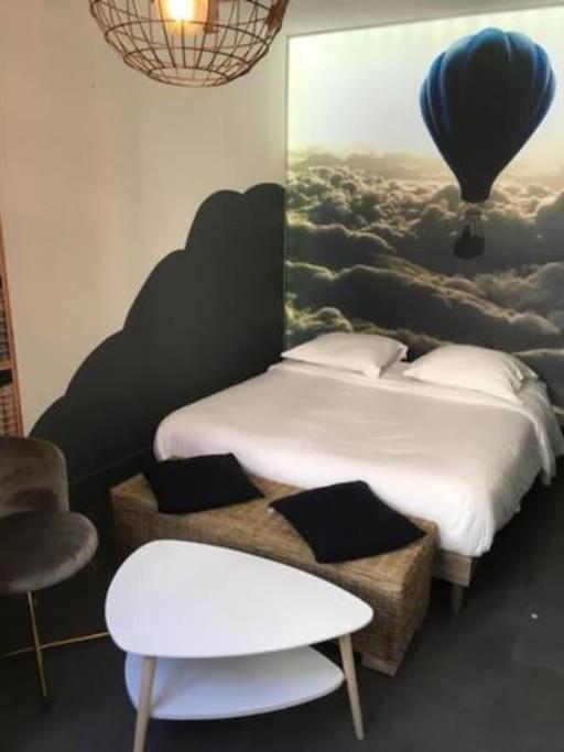 La tête dans les nuages - Housity