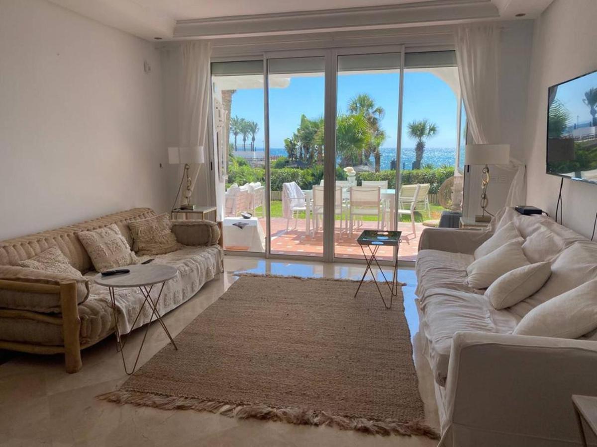 Flat with garden on the first line of the sea in Puerto Banus - Housity
