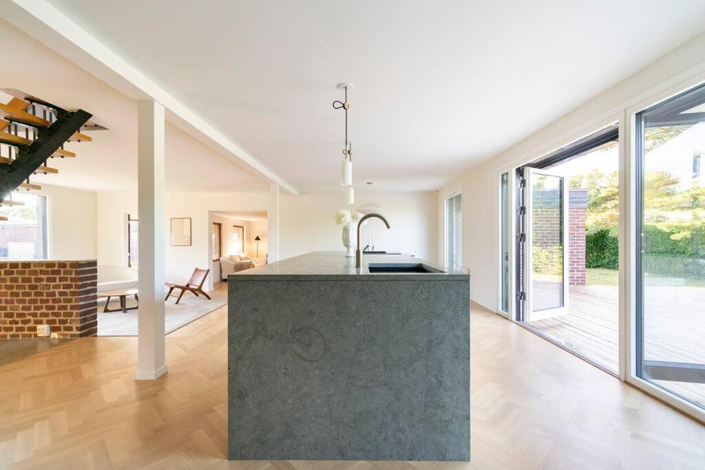 Villa Falsterbo - Beachside Luxury with Private Hot Tub - Housity