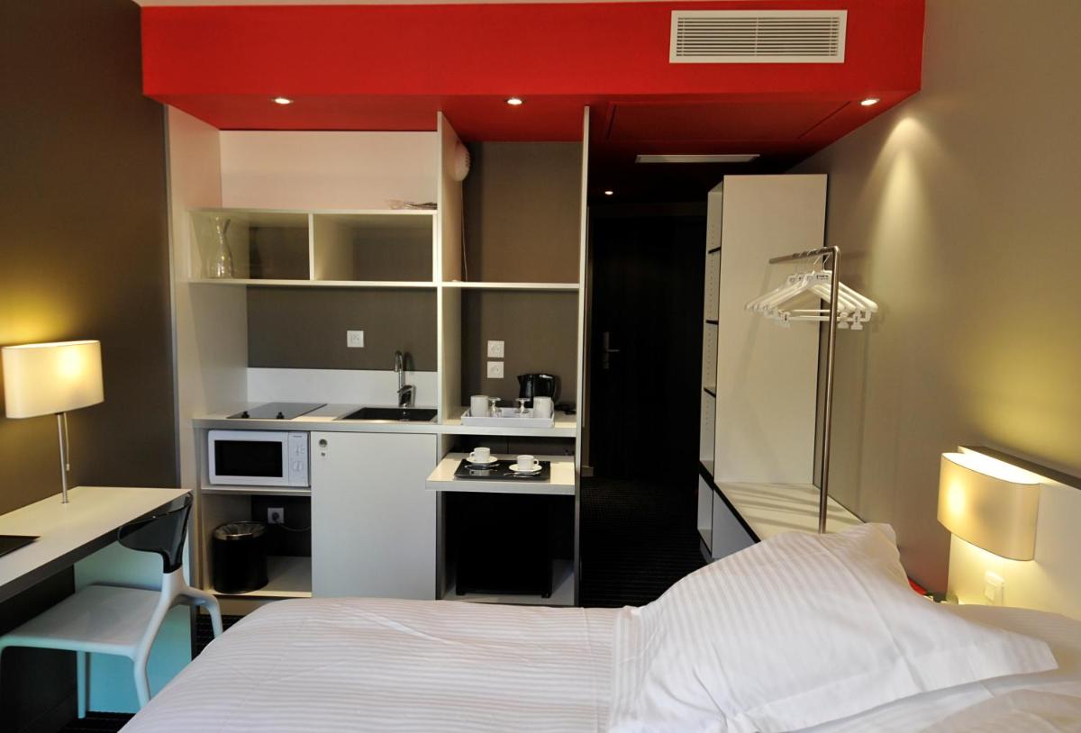 Cuisine ou kitchenette dans l'établissement B&B HOME Lyon Centre Berthelot