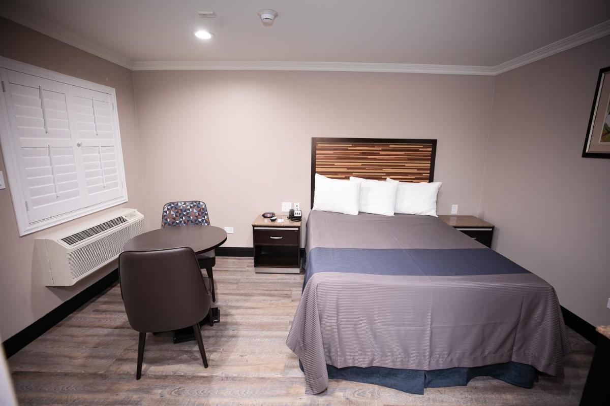 Diamond Bell Inn & Suites - Housity