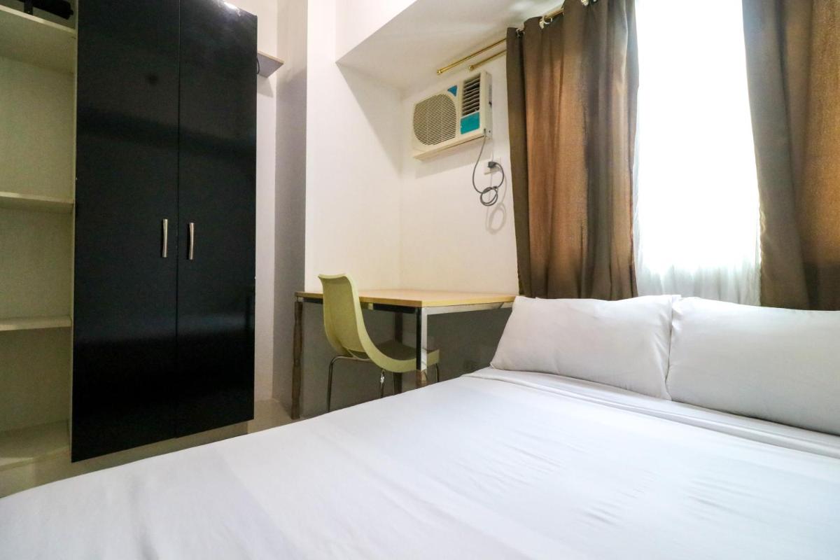 StayHere SM Light Tropical Staycation Boni MRT - Housity