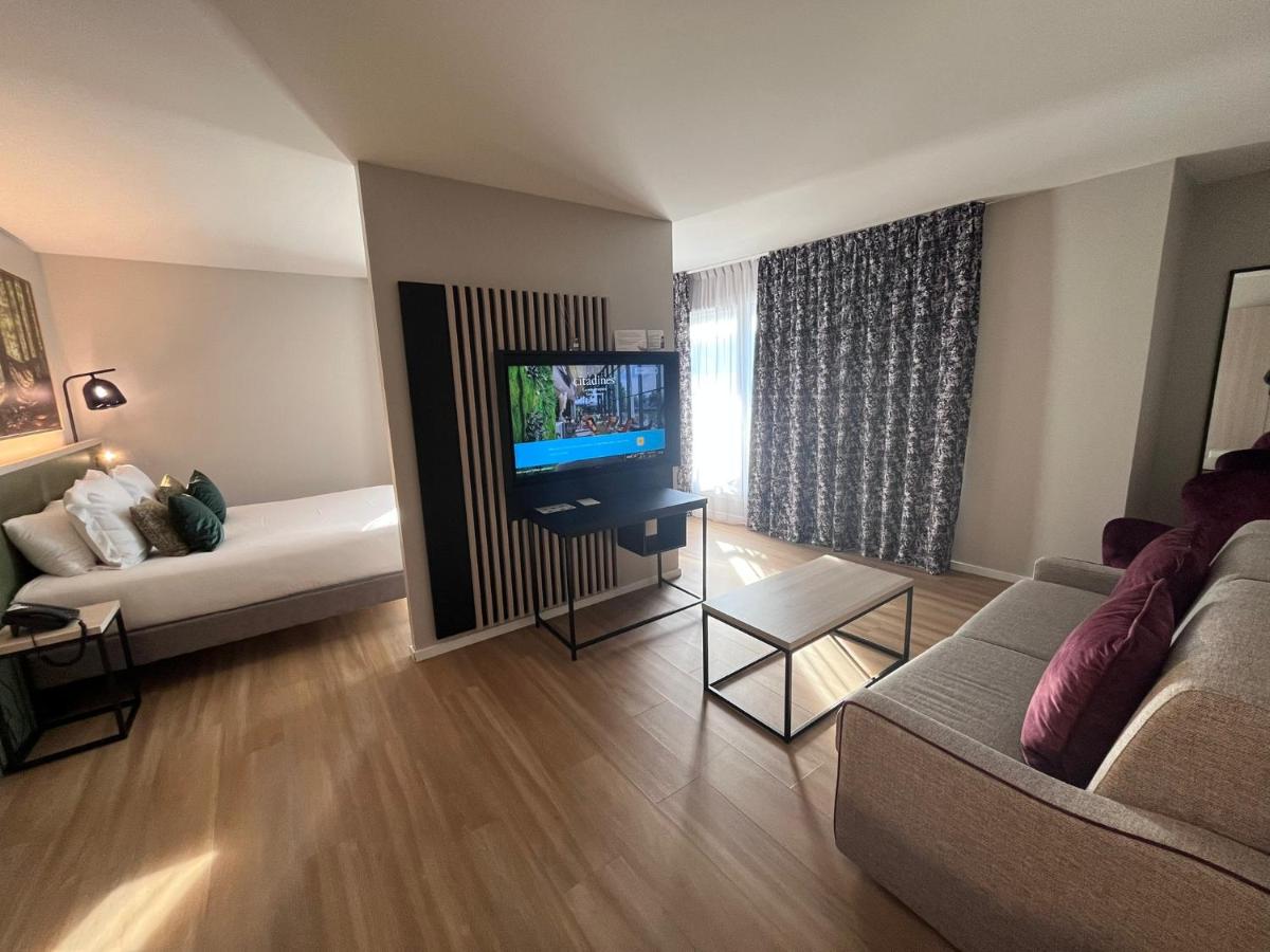 Télévision ou salle de divertissement dans l'établissement Citadines Eurometropole Strasbourg