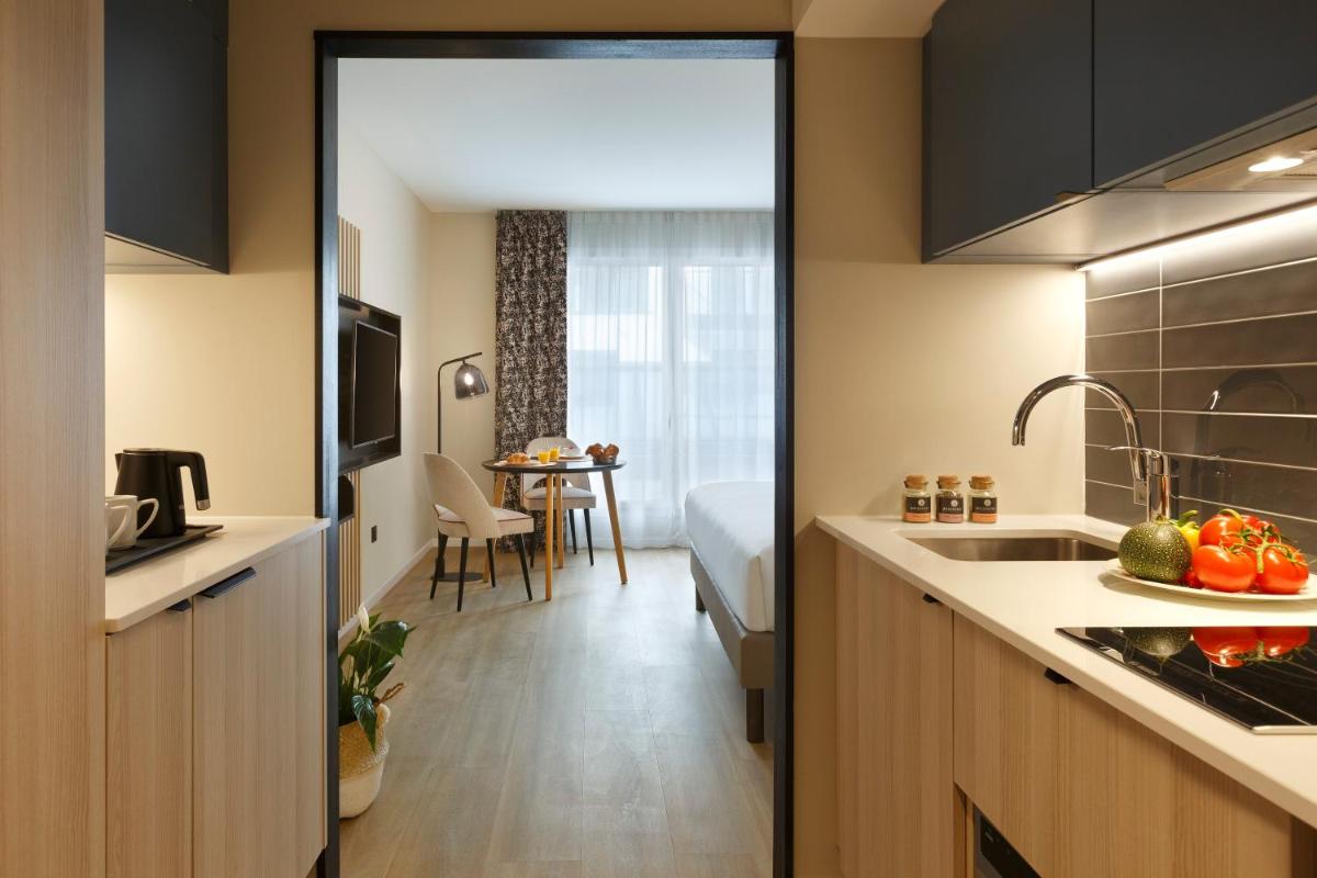 Cuisine ou kitchenette dans l'établissement Citadines Eurometropole Strasbourg