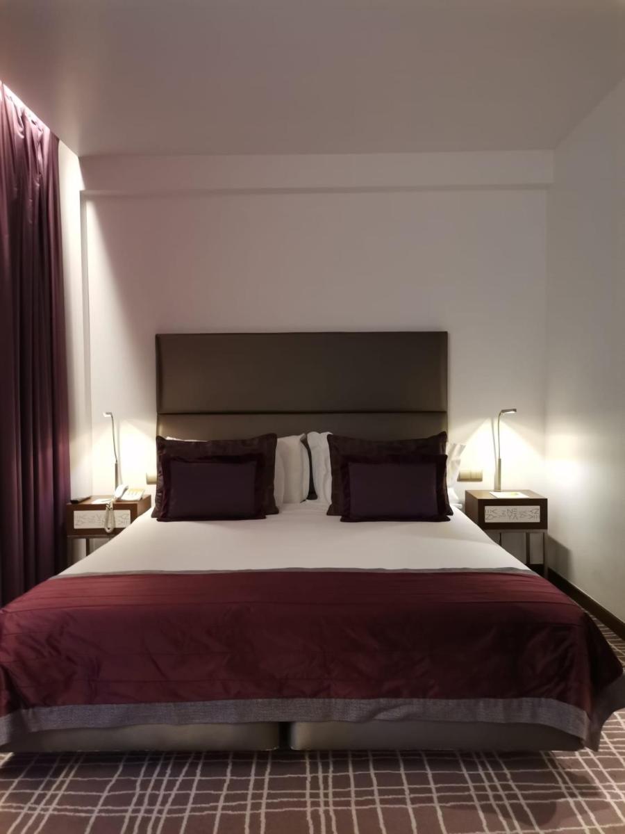 Uma cama ou camas num quarto em NEYA Lisboa Hotel