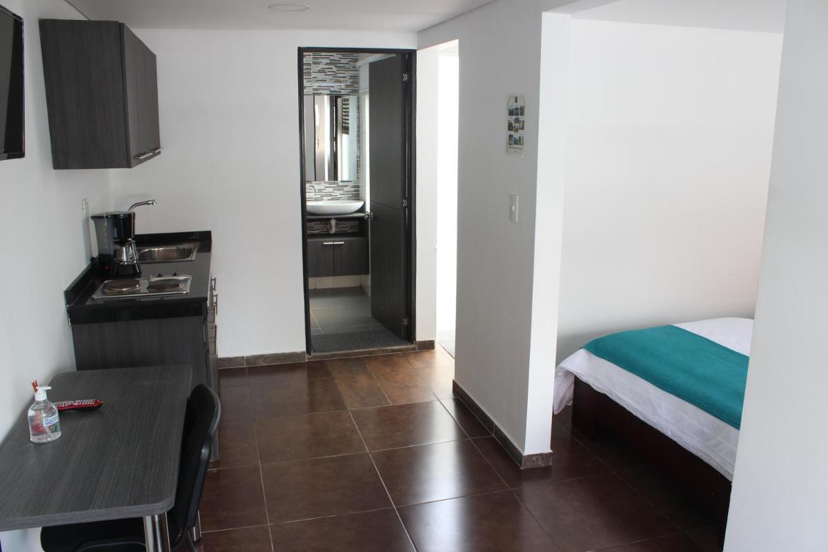 Apartahotel Dorado Central - Housity