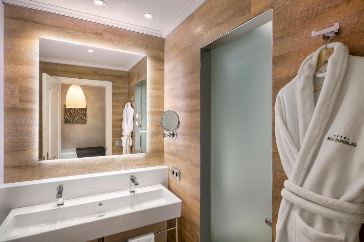 Un baño de Mas Tapiolas