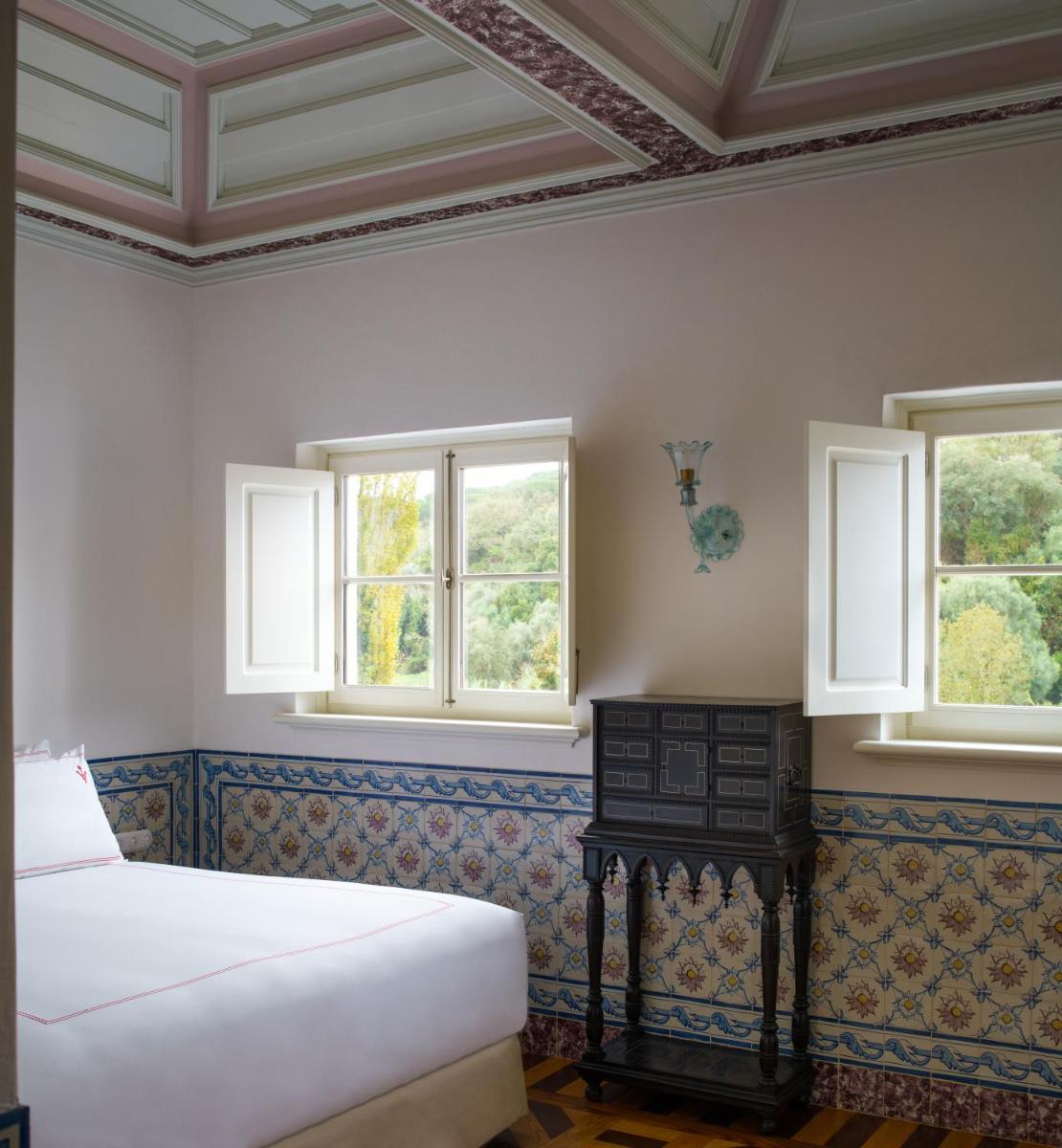 Uma cama ou camas num quarto em Vermelho Melides - Relais & Châteaux