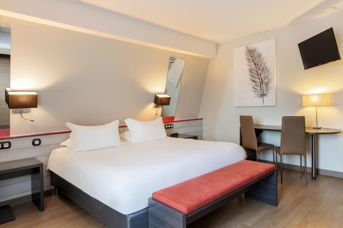 Un ou plusieurs lits dans un hébergement de l'établissement Best Western Hotel & SPA Pau Lescar Aeroport