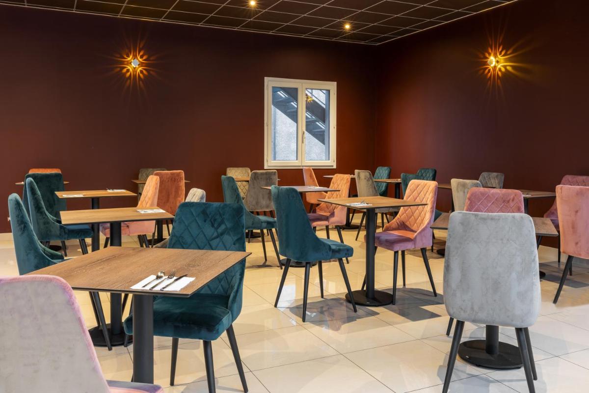 Coin salon dans l'établissement Best Western Hotel & SPA Pau Lescar Aeroport