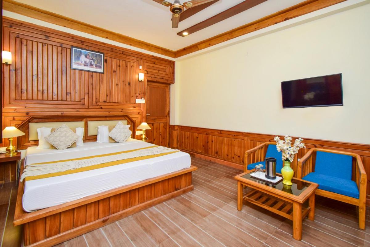 Swiss Cottage by Dumnu Homes next to Kangna Ranaut's house - Housity