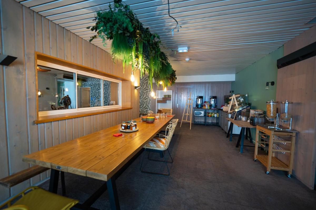 Restaurant ou autre lieu de restauration dans l'établissement Hob Fort du Pré