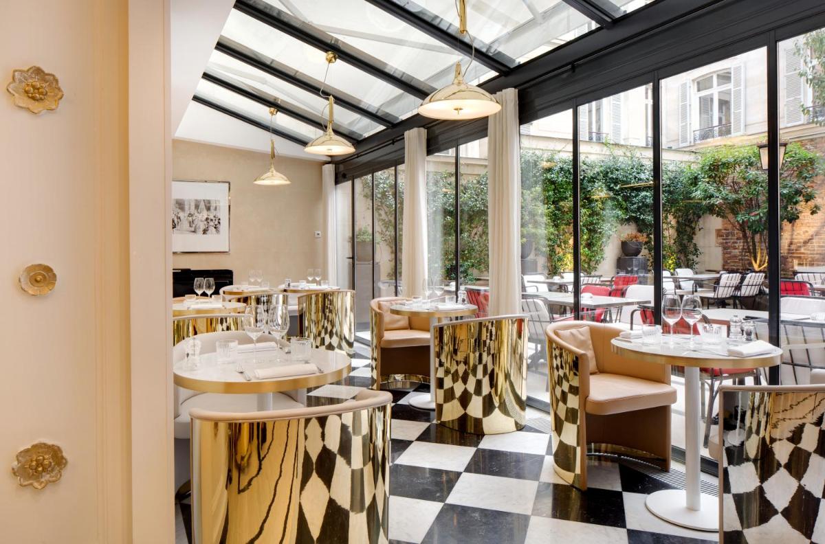 Restaurant ou autre lieu de restauration dans l'établissement Hotel Bowmann