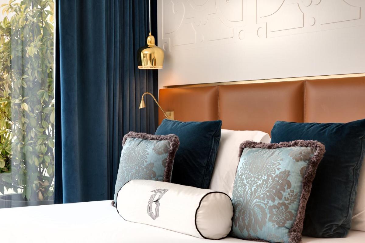 Un ou plusieurs lits dans un hébergement de l'établissement Hotel Bowmann