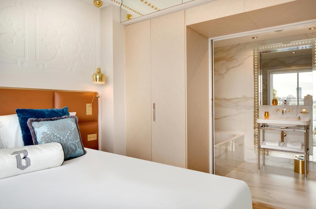 Un ou plusieurs lits dans un hébergement de l'établissement Hotel Bowmann
