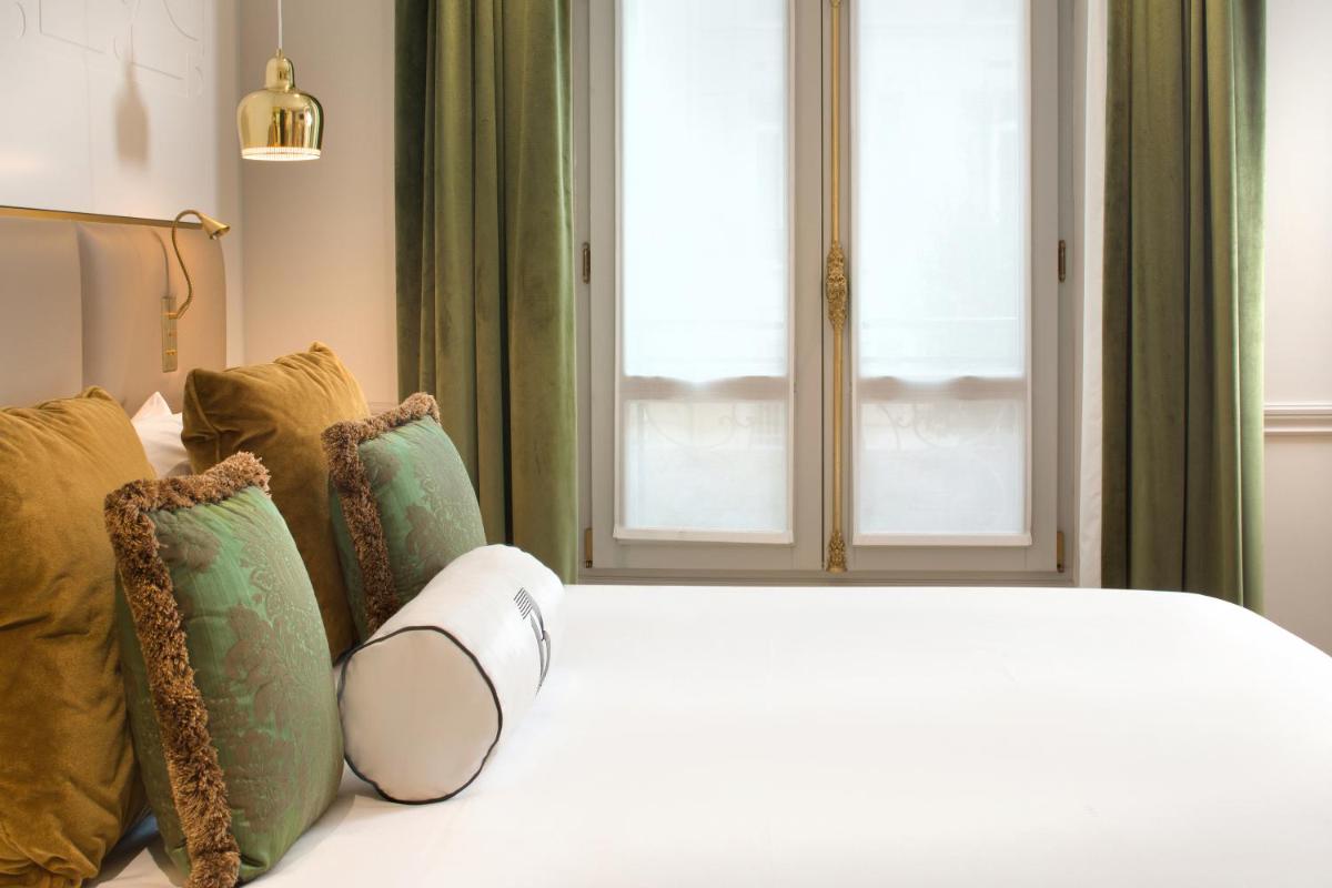Un ou plusieurs lits dans un hébergement de l'établissement Hotel Bowmann