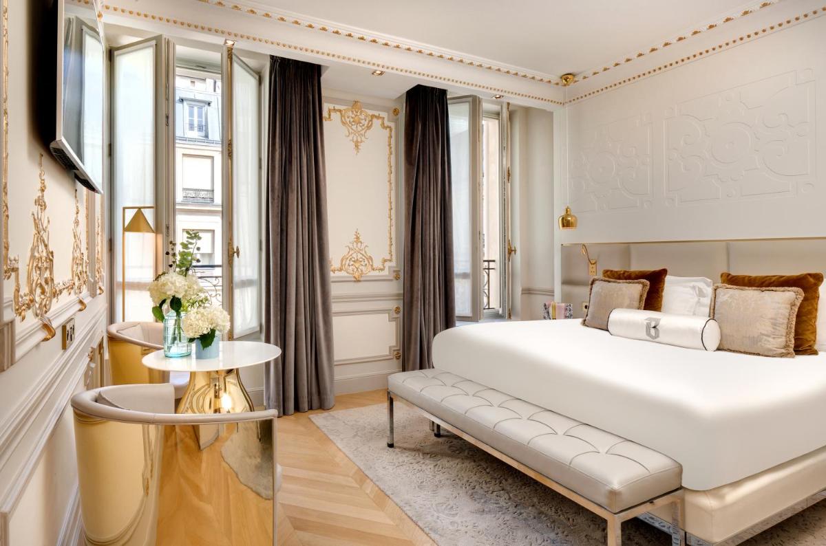 Un ou plusieurs lits dans un hébergement de l'établissement Hotel Bowmann