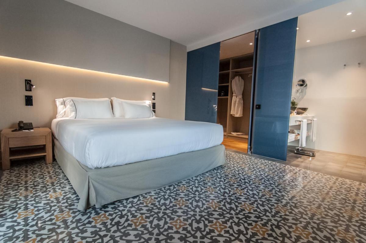 Cama o camas de una habitación en Hotel Sorli Emocions