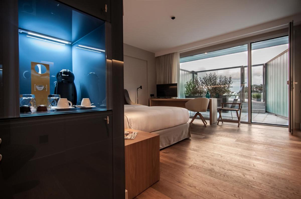 Cama o camas de una habitación en Hotel Sorli Emocions