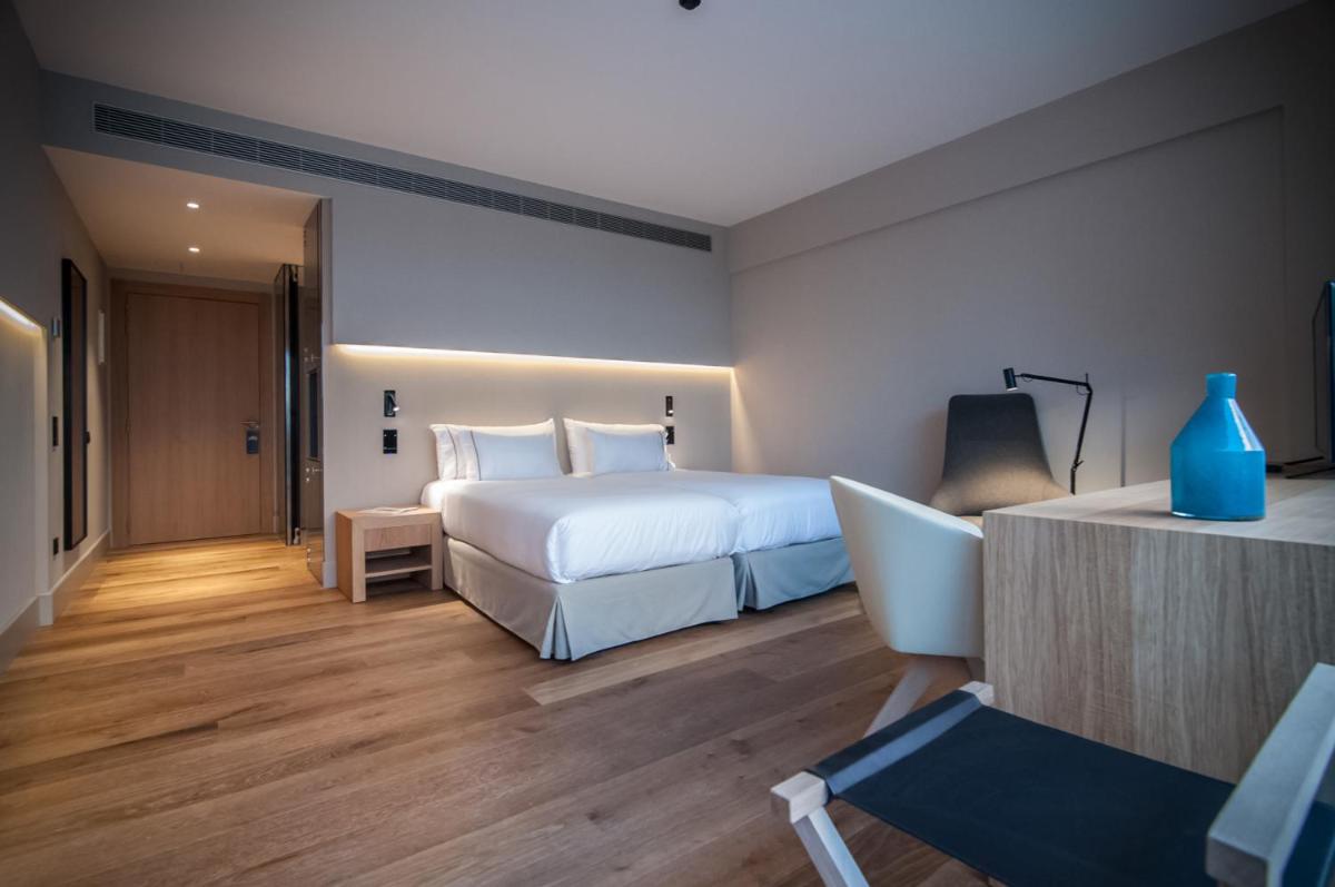 Cama o camas de una habitación en Hotel Sorli Emocions