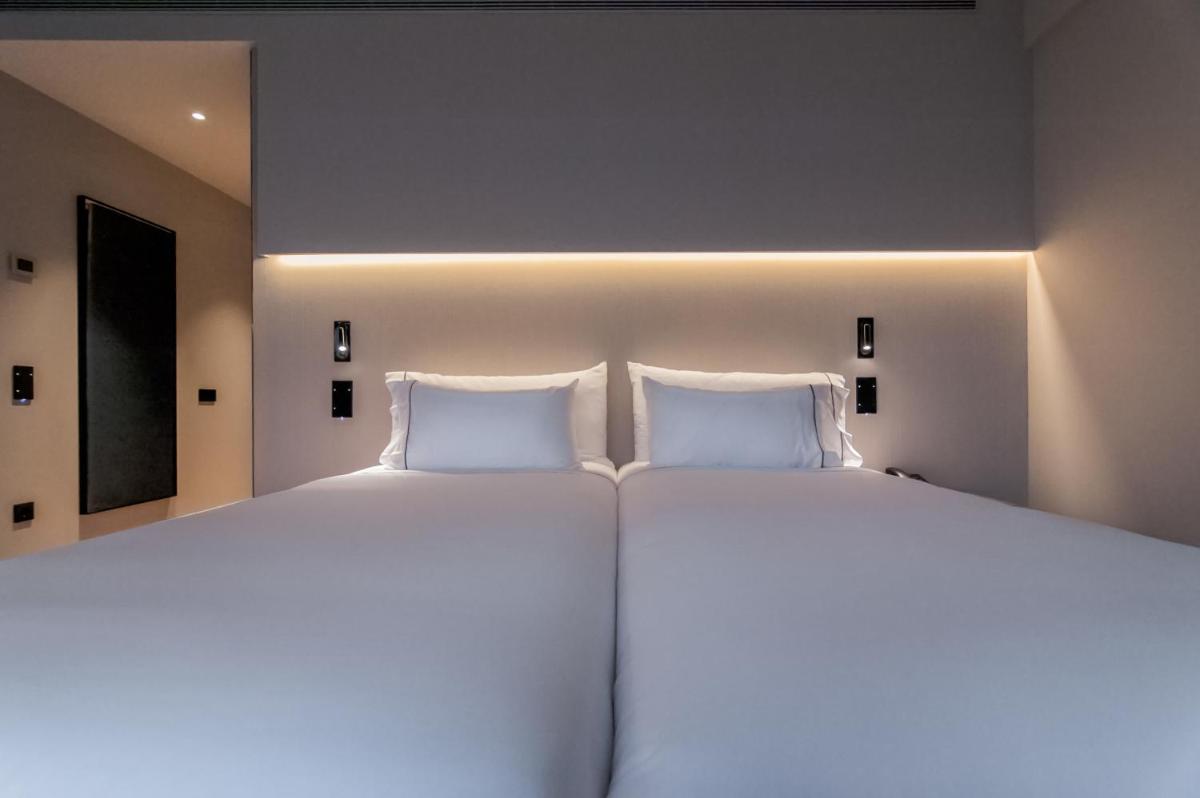 Cama o camas de una habitación en Hotel Sorli Emocions