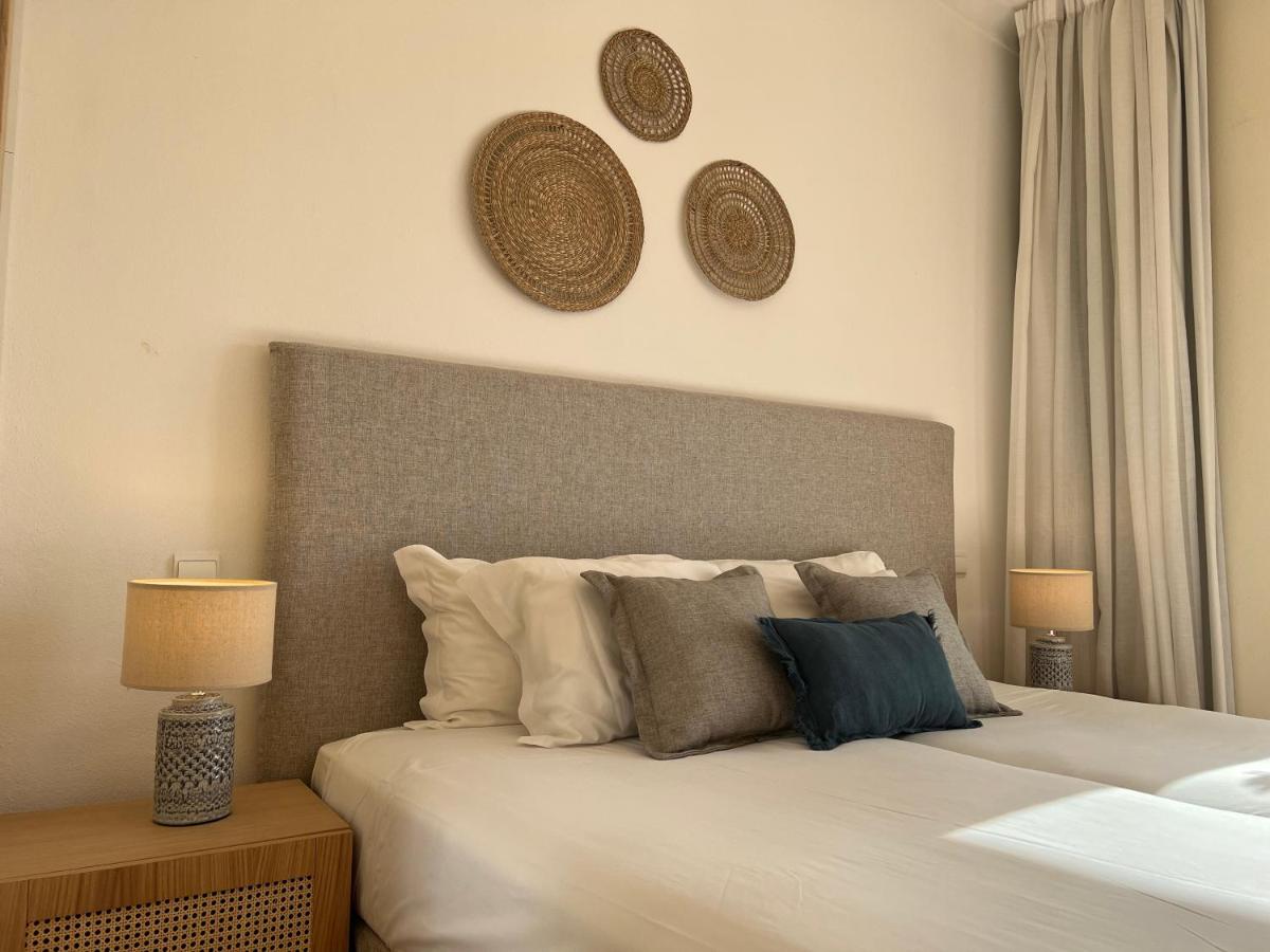 Uma cama ou camas num quarto em Pestana Palm Gardens