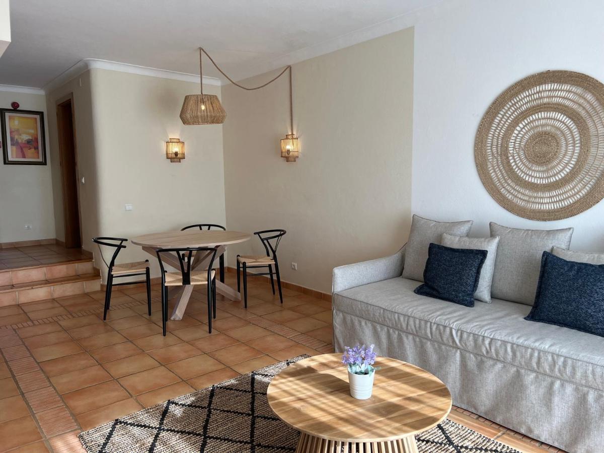 Uma área de estar em Pestana Palm Gardens