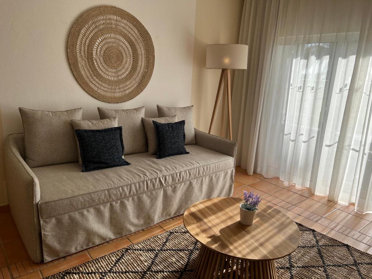 Uma área de estar em Pestana Palm Gardens