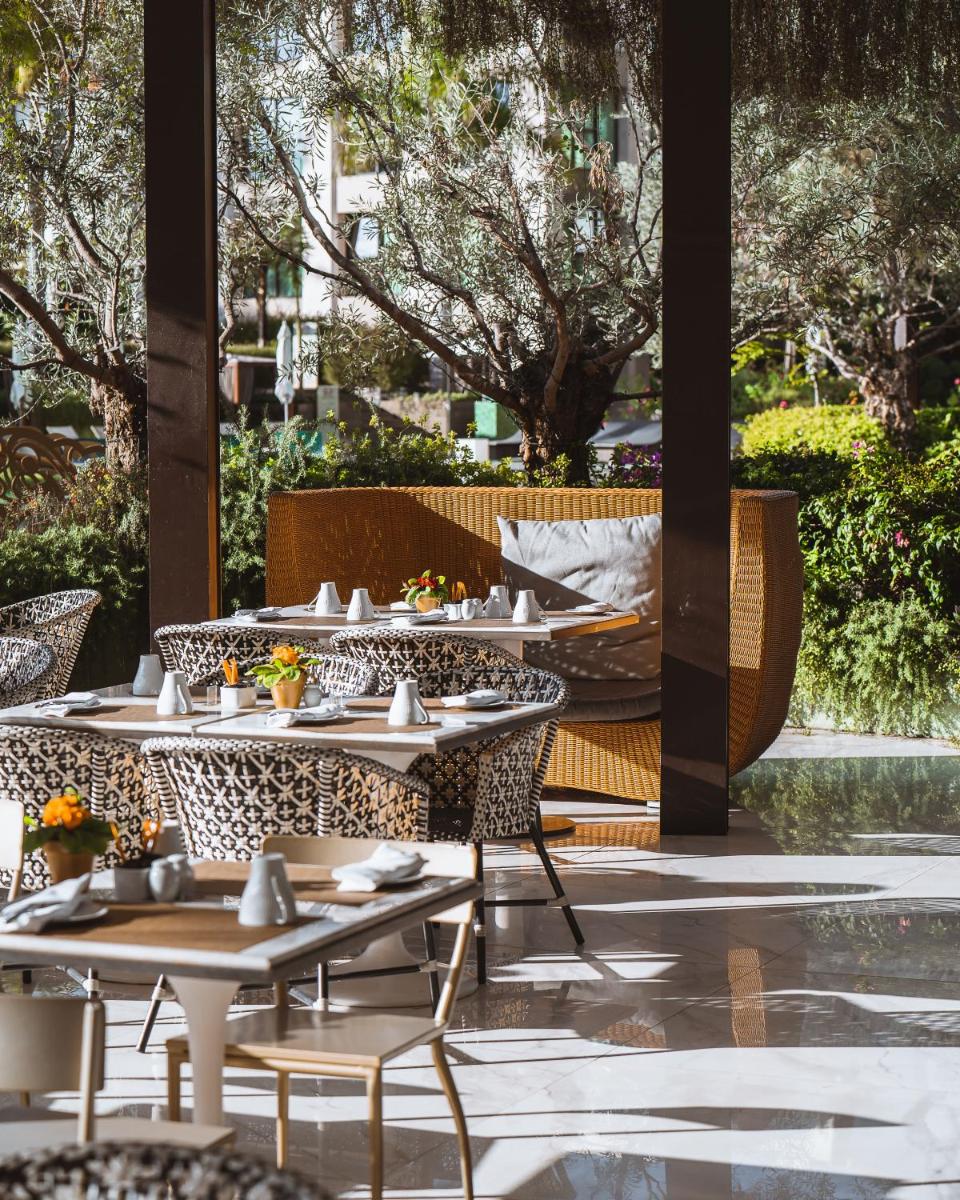 Um jardim no exterior de Savoy Palace - The Leading Hotels of the World - Savoy Signature