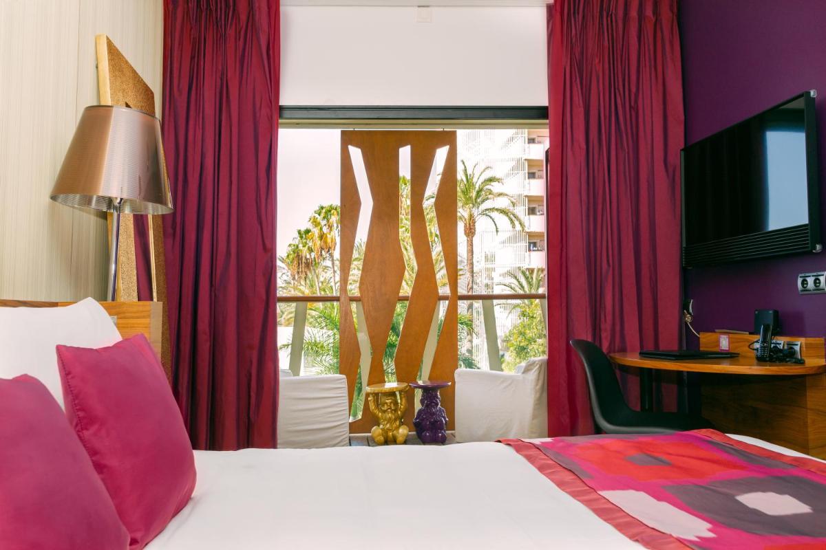Cama o camas de una habitación en Bohemia Suites & Spa - Adults Only