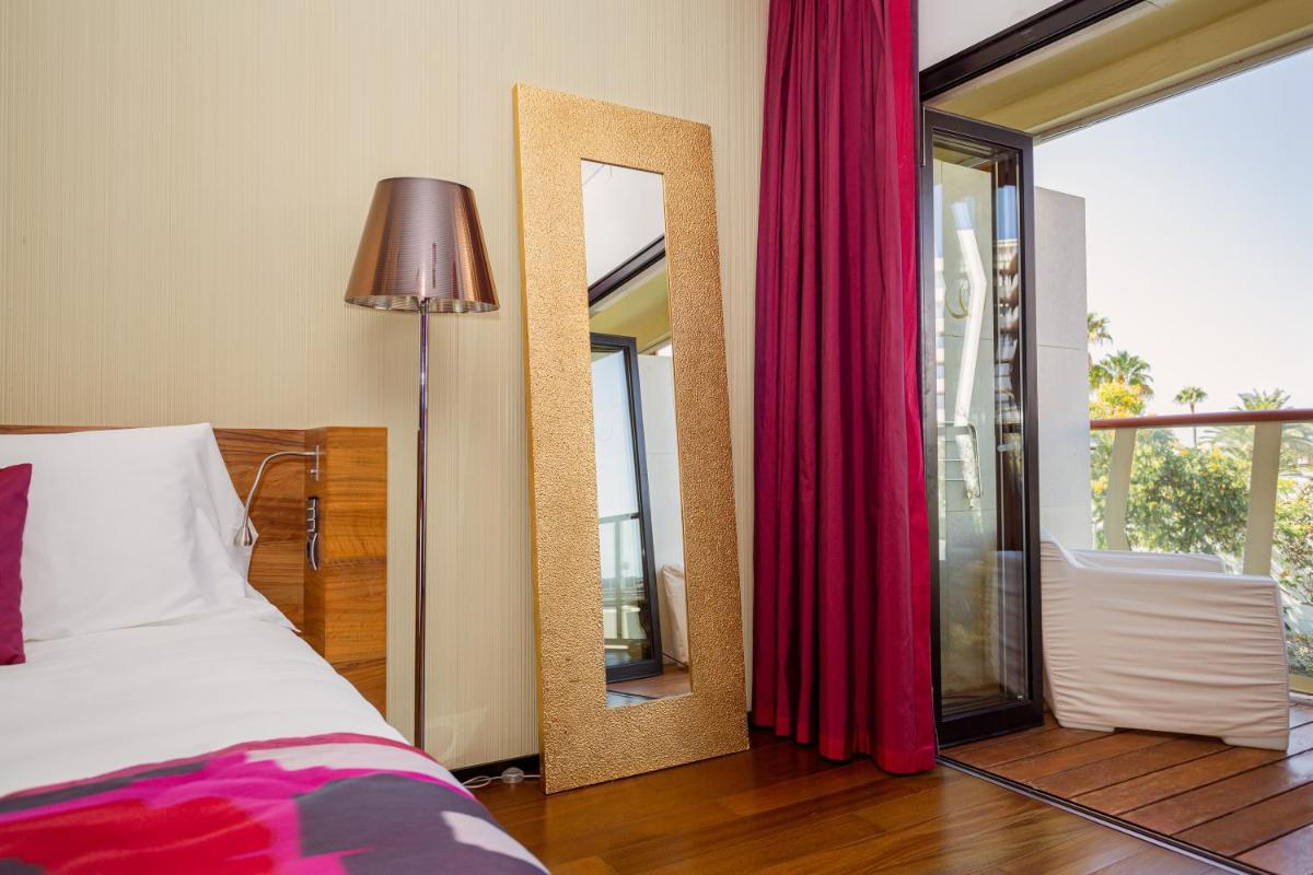 Cama o camas de una habitación en Bohemia Suites & Spa - Adults Only