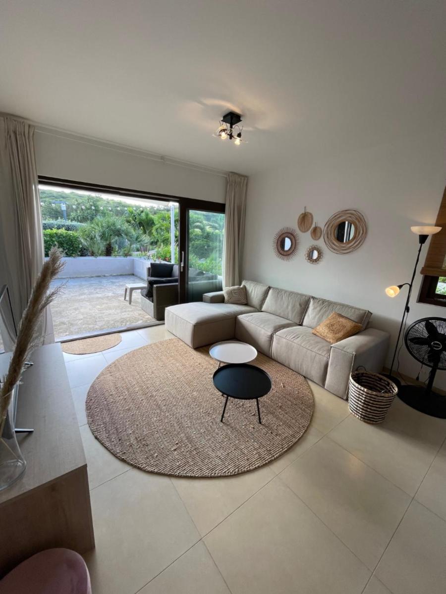 NEWLY STYLED Beach House 'White Sands' GreenView BlueBay Golf & Beach Resort Curaçao 2 bedrooms 2 bathrooms Gated Community Ground Floor Terrace Including Pool & Beach Access Fully Airconditioned Family Friendly - Housity