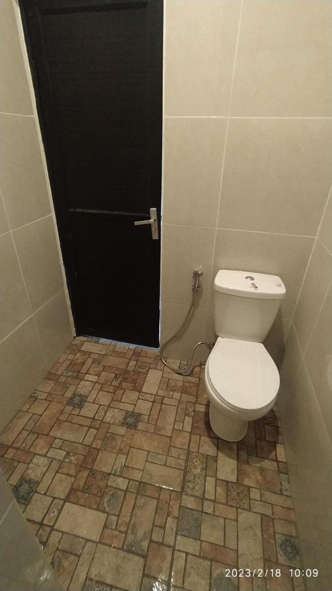 21 Guest House Syariah - Housity