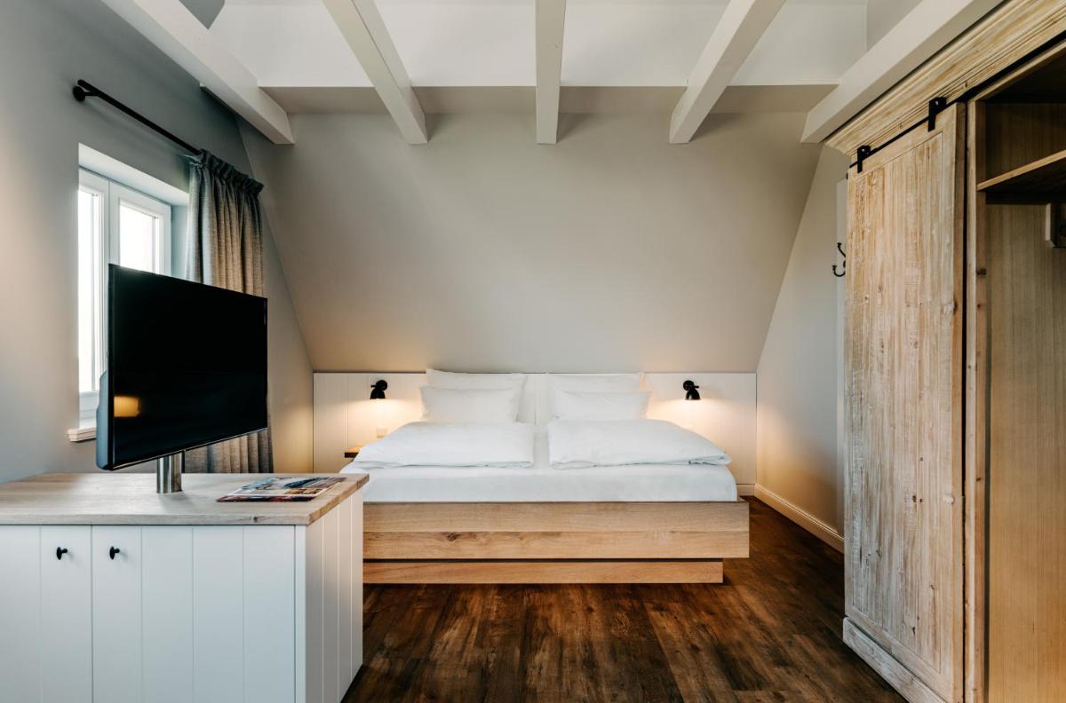 Ein Bett oder Betten in einem Zimmer der Unterkunft Seaside 43