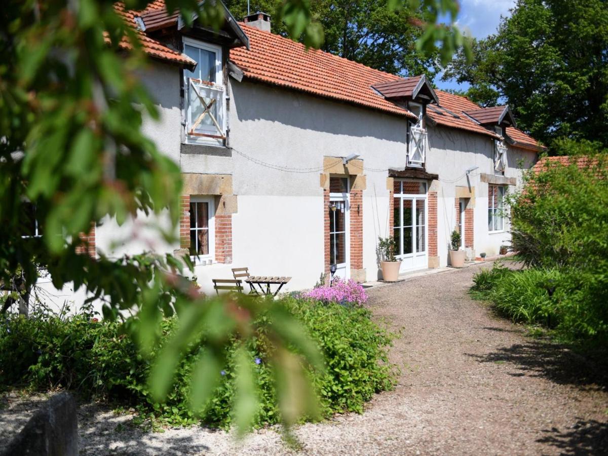 Ressourcez-vous dans cette ferme avec cheminée, jardin, terrasse couverte et équipements modernes - FR-1-489-435 - Housity