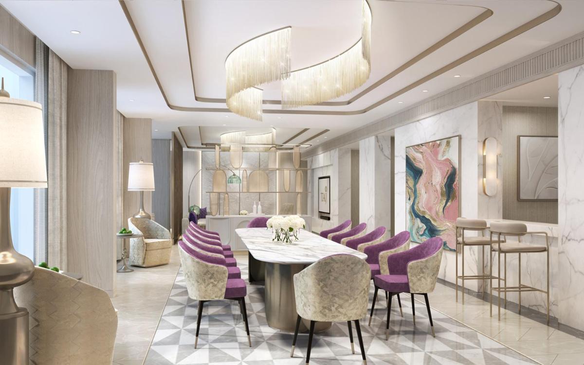 a dining room with purple chairs and a table at Taj Amer, Jaipur in Jaipur
