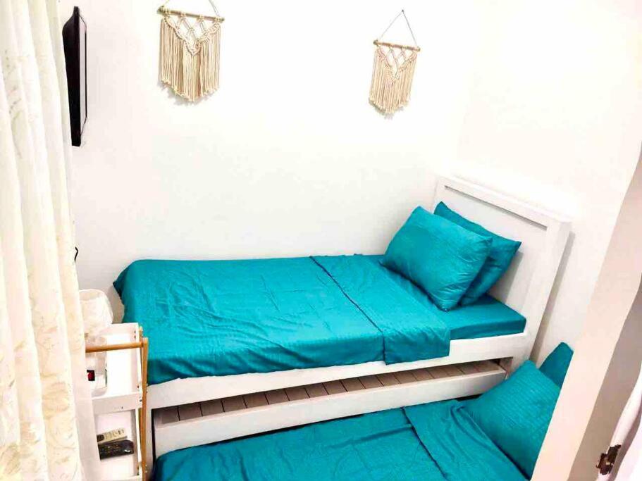 Near Malolos Crossing white & wood Loft - Housity