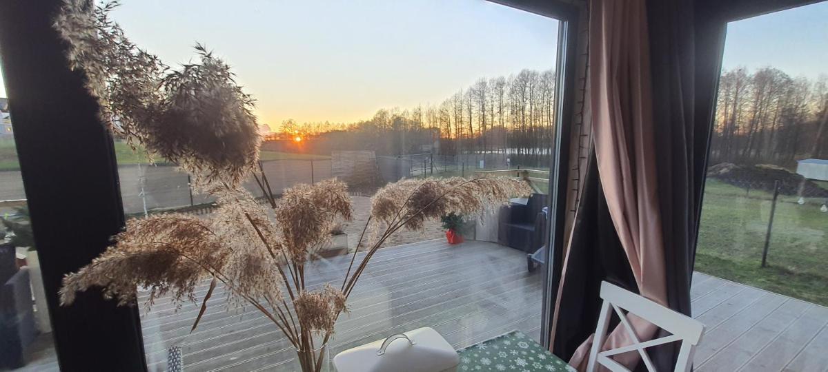 Domek mazurski całoroczny nad jeziorem z jacuzzi SPA - Housity
