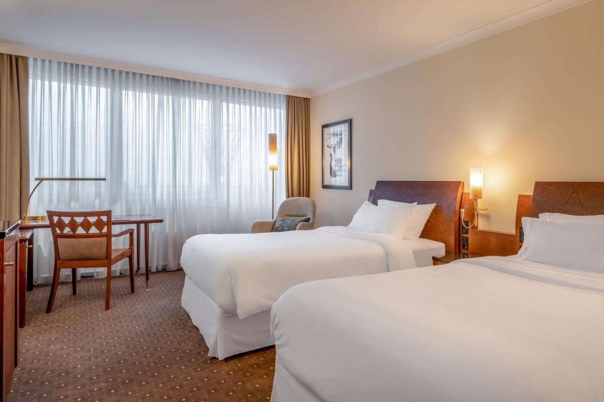 Ein Bett oder Betten in einem Zimmer der Unterkunft The Westin Grand Munich Ein Bett oder Betten in einem Zimmer der Unterkunft The Westin Grand Munich