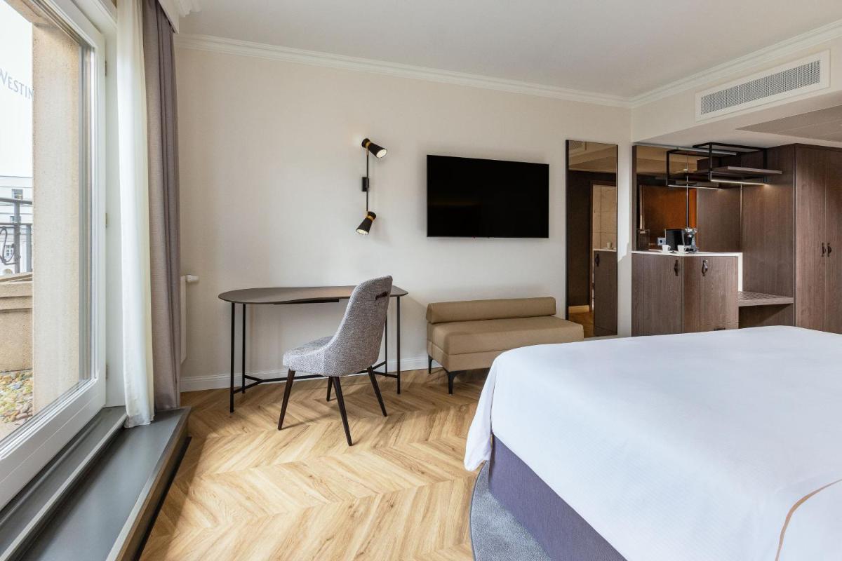 Ein Bett oder Betten in einem Zimmer der Unterkunft The Westin Grand Berlin