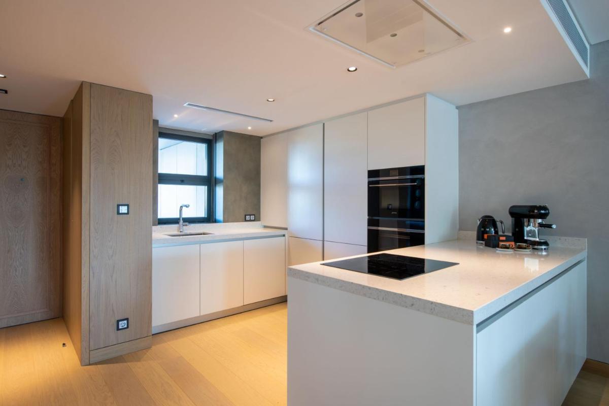 A cozinha ou kitchenette de W Residences Algarve