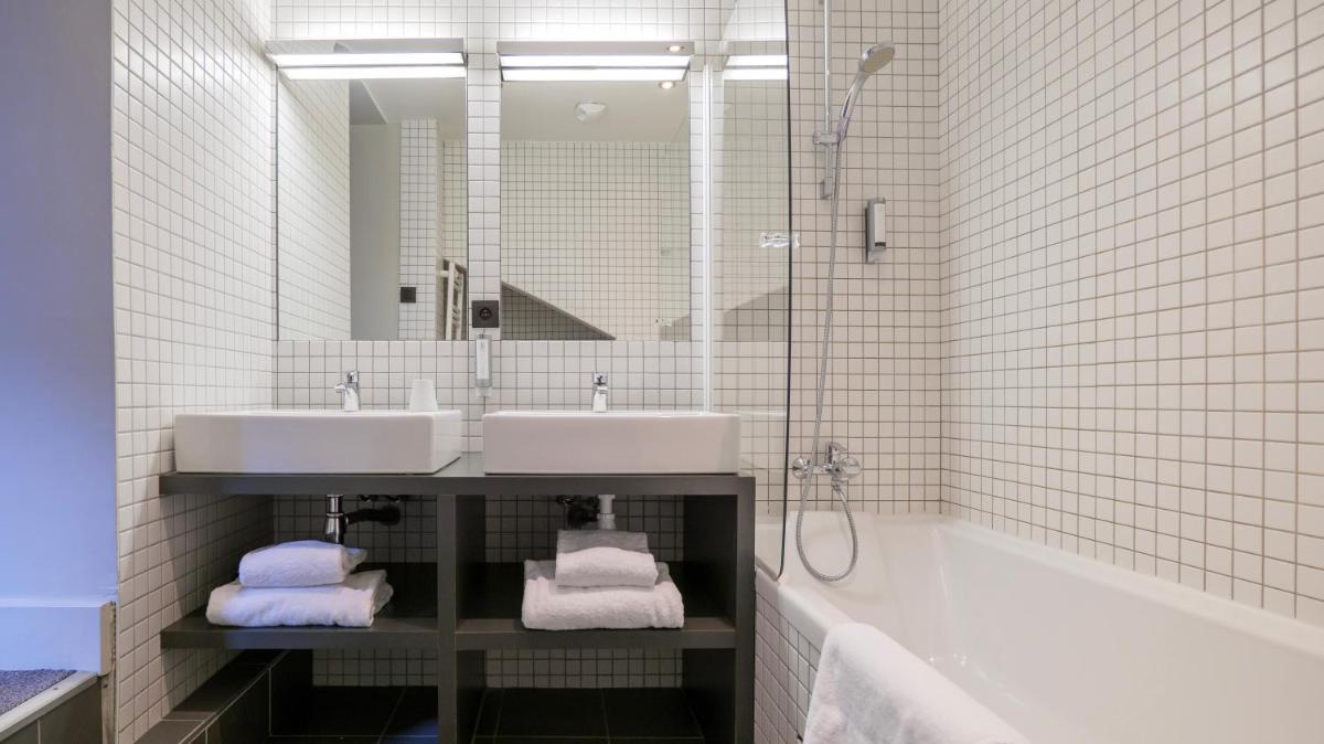 Salle de bains dans l'établissement Le Faucigny - Hotel de Charme & SPA