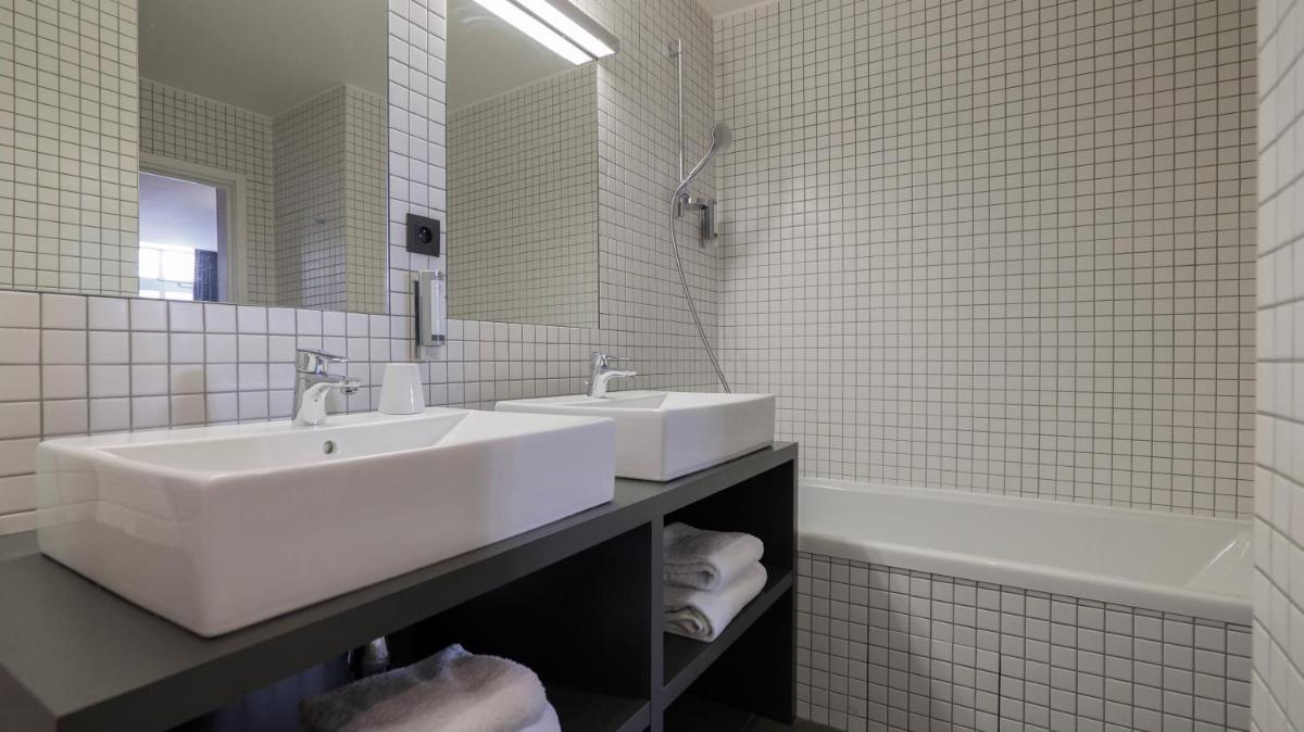 Salle de bains dans l'établissement Le Faucigny - Hotel de Charme & SPA