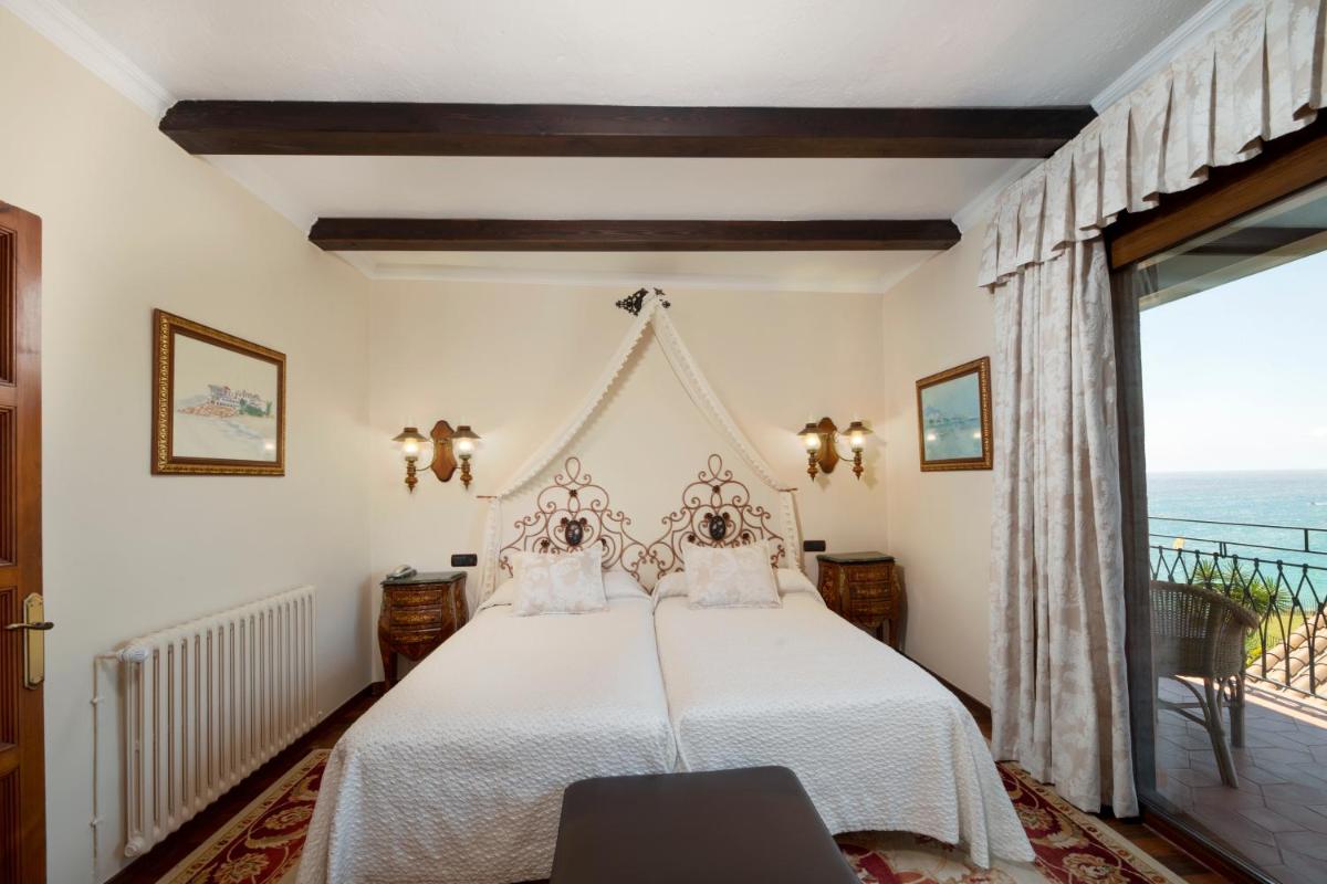 Cama o camas de una habitación en Rigat Park & Spa Hotel - Adults Recommended