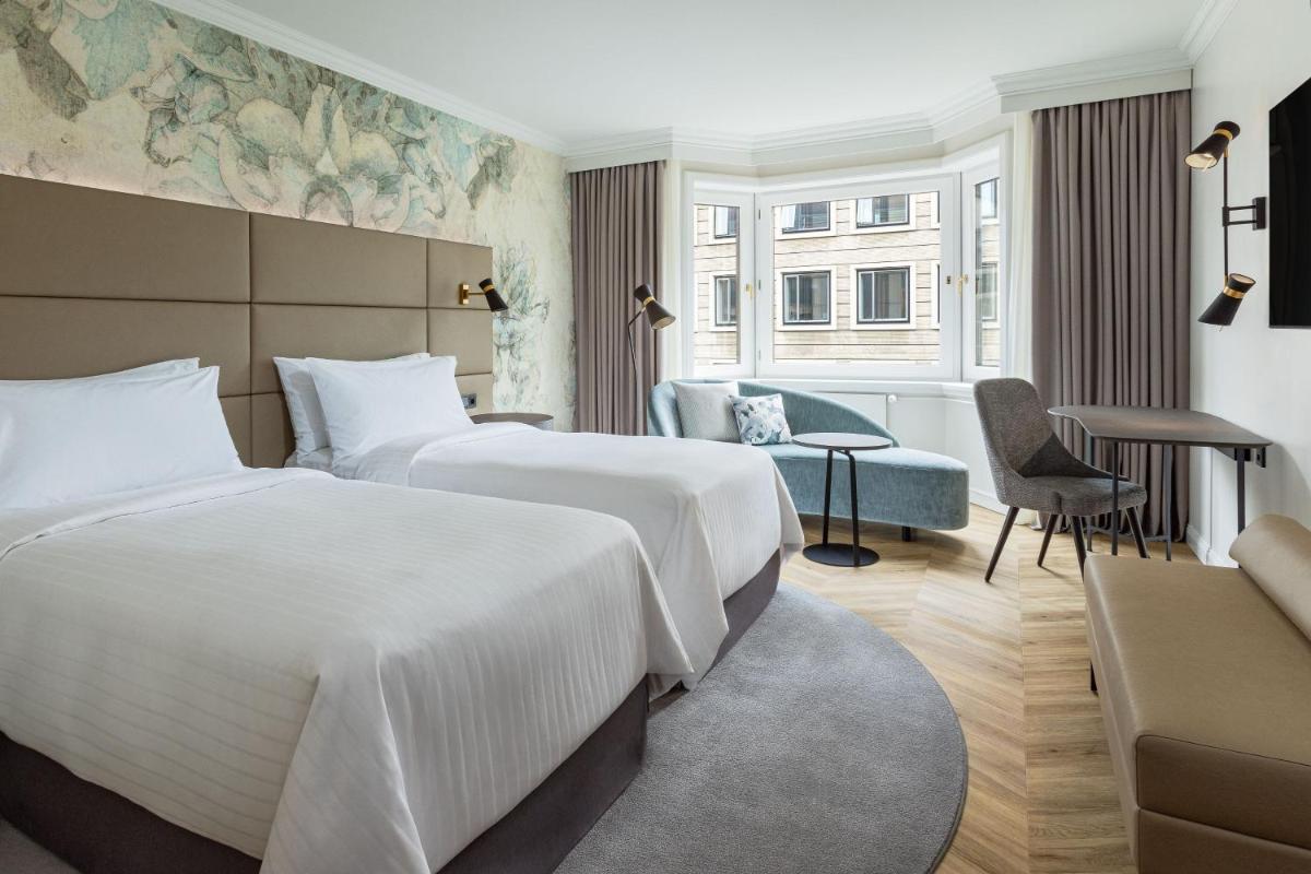 Ein Bett oder Betten in einem Zimmer der Unterkunft The Westin Grand Berlin