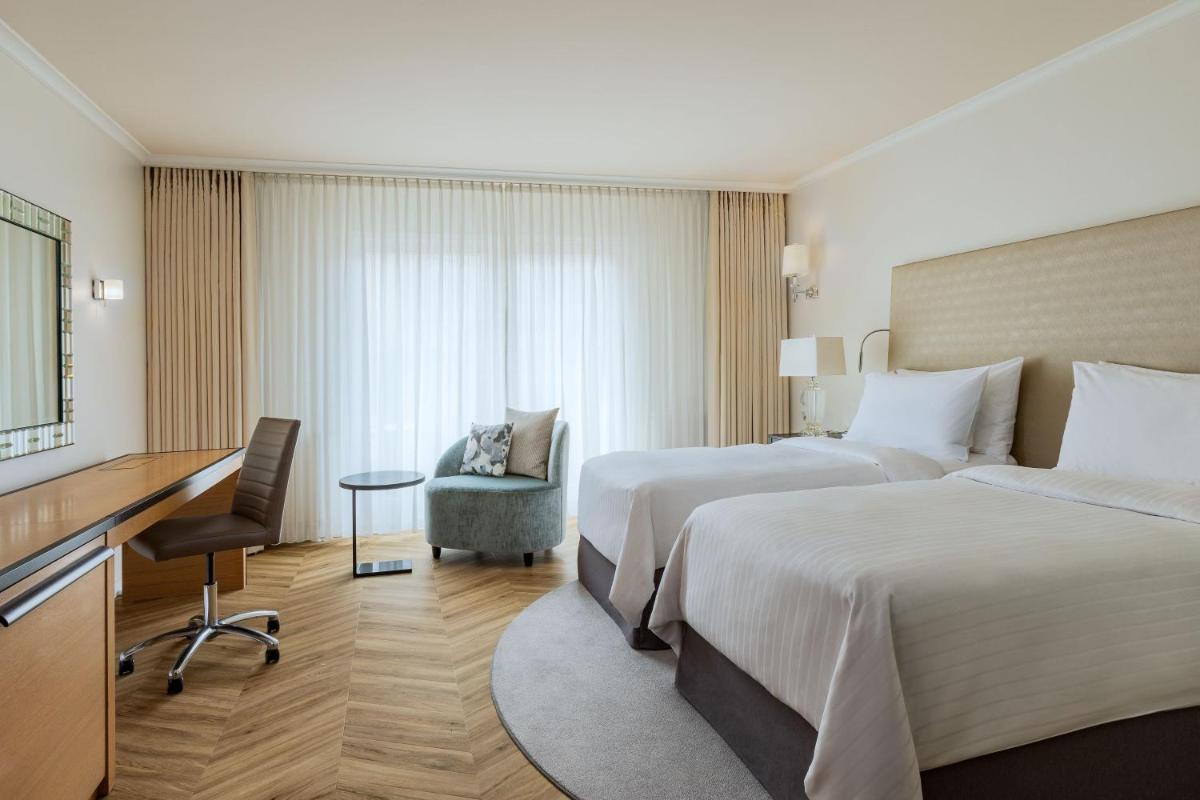 Ein Bett oder Betten in einem Zimmer der Unterkunft The Westin Grand Berlin