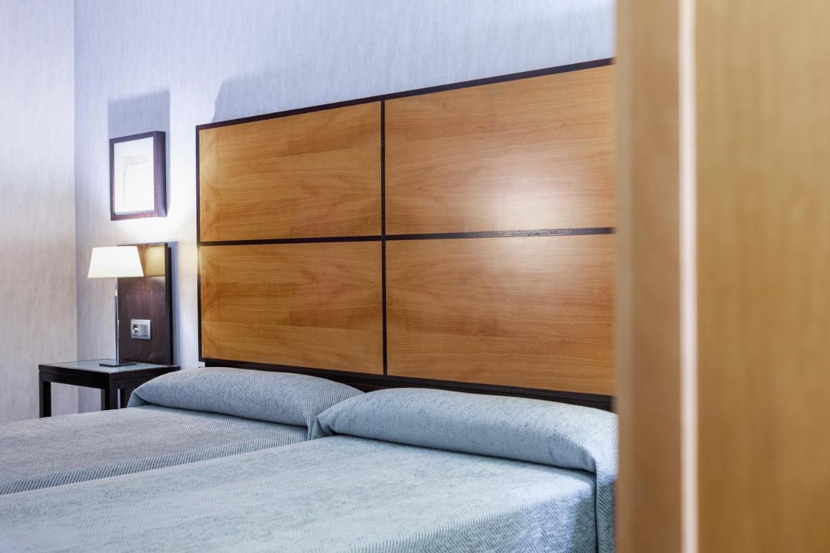 Cama o camas de una habitación en Hotel Macià Real De La Alhambra
