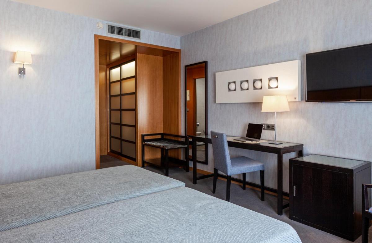 Cama o camas de una habitación en Hotel Macià Real De La Alhambra