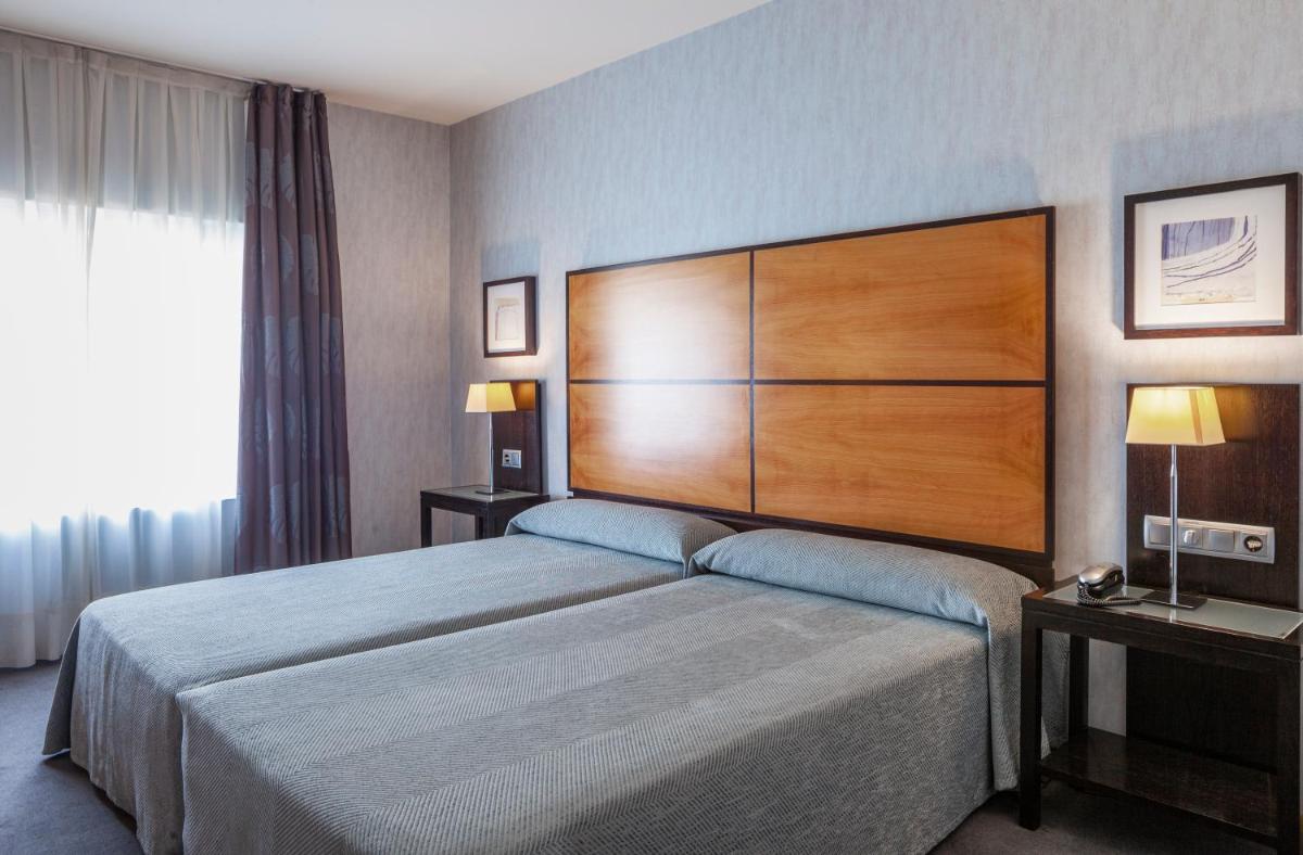 Cama o camas de una habitación en Hotel Macià Real De La Alhambra